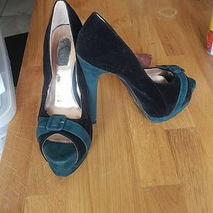 Black and green pumps